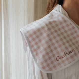 Burp Cloth in Picnic Gingham Pink on Mothers shoulder