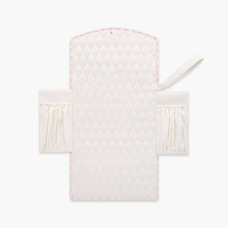 Portable Changing Pad in Pink Gingham. Inside is Ivory with pocket detail