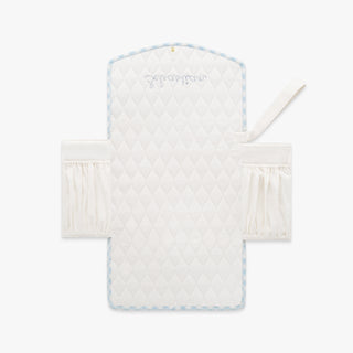 Portable Changing Pad in Blue Gingham. Inside is Ivory with pocket detail