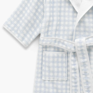 Light blue and white checkered robe with a pocket on a white background