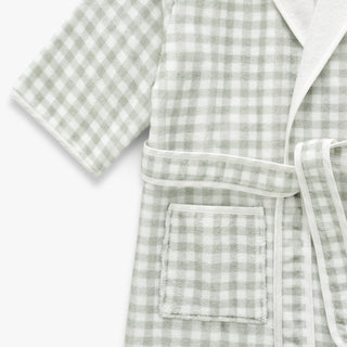 Green and white checkered robe with a pocket on a white background