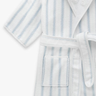 White bathrobe with blue stripes on a white background