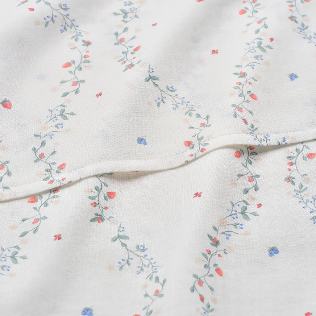 Botanical Berries Swaddle in Ivory up close shot