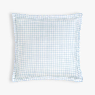 Blue checkered pillow on a white background