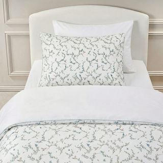 Twin duvet set in the "Secret Garden" print in the color ivory, the set includes a duvet cover and a standard pillowcase