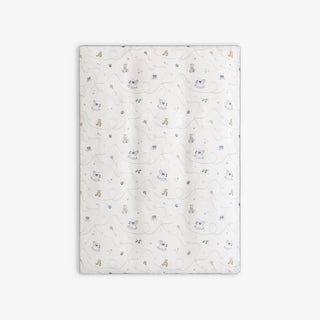 rocking horse and teddy bear patterned blanket on a white background