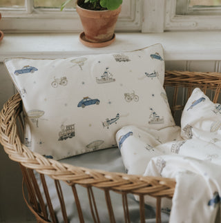 Transport Treasures Toddler Pillow in Blue in bassinet