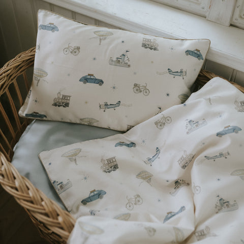 Transport Treasures Toddler Pillow in Blue in bassinet
