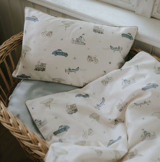 Transport Treasures Toddler Pillow in Blue in bassinet