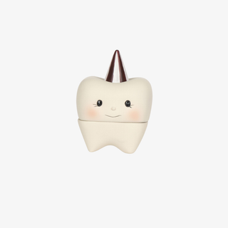 Cute tooth-shaped container with a smiling face on a white background