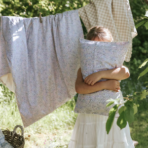 Toddler hugging a Toddler Pillow