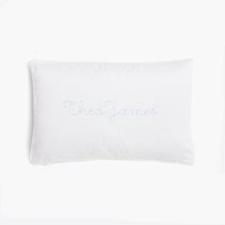 Toddler Pillow in Coastal Stripes in Blue  back side with the monogram "Theo James"