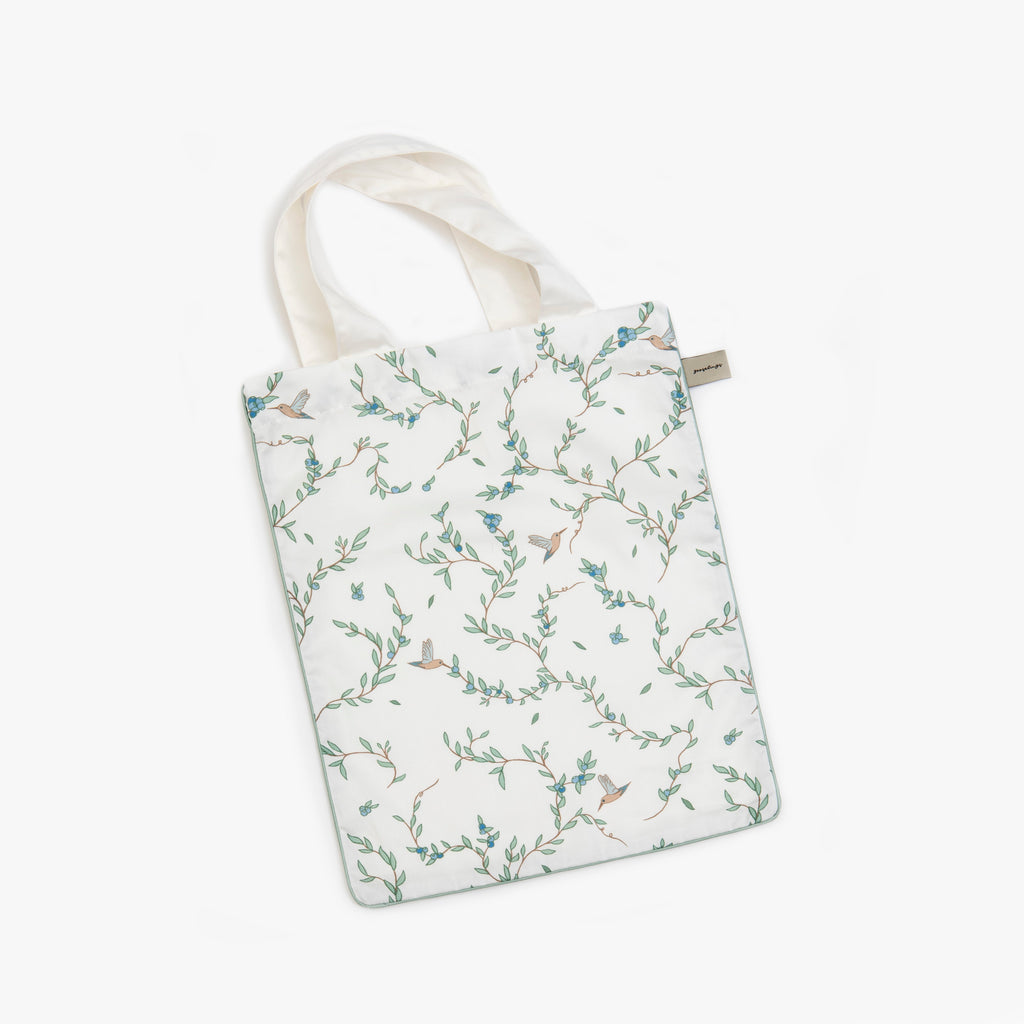 Printed tote bag is included with the bedding set in the "Secret Garden" print in the color ivory