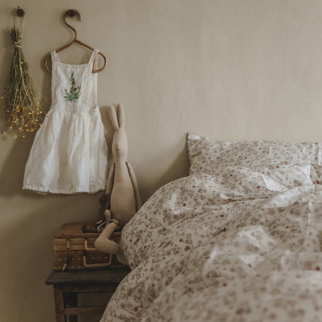 Full Queen Duvet Cover in the "Into The Woodlands" print in the color ivory. Two Standard Pillowcases shown in same printe