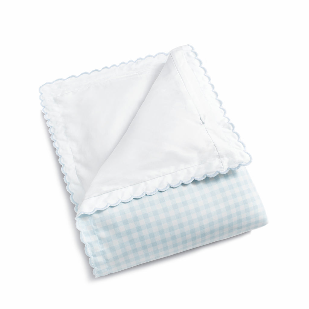 folded blue gingham baby duvet 