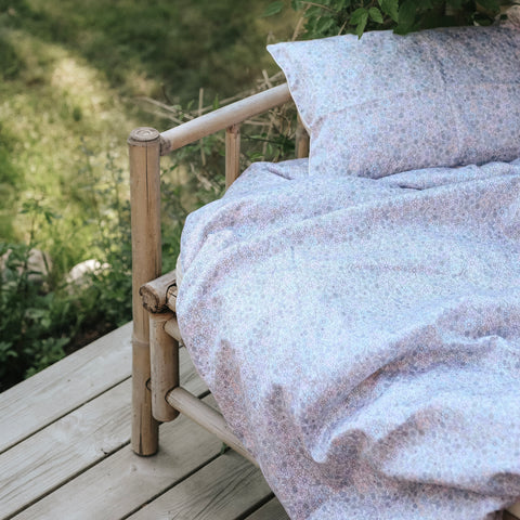 Toddler Duvet laying on a bench