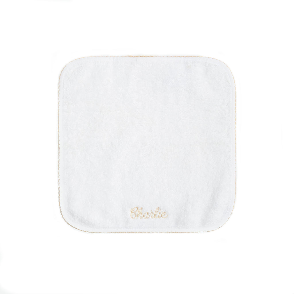 Classic washcloth with Beige trim detail. Washcloth can be personalized with childs name.