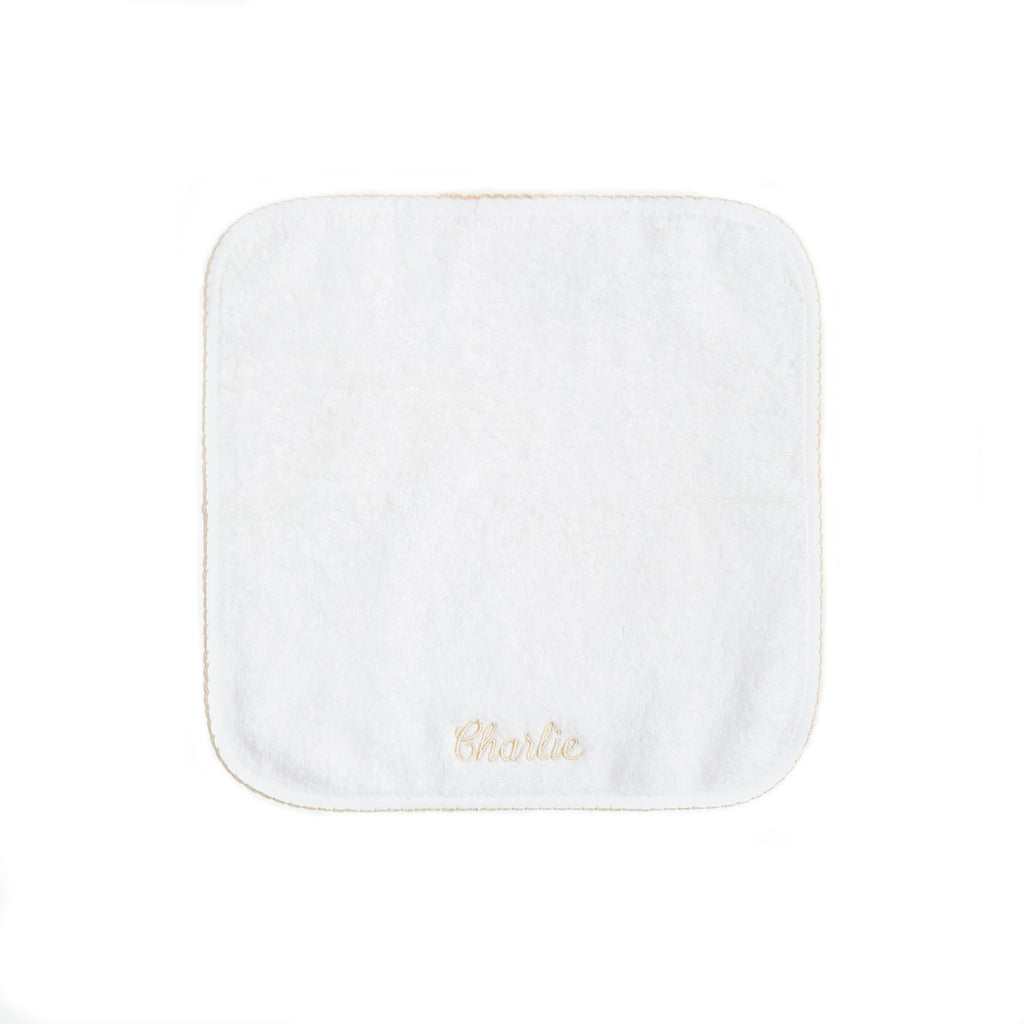 Classic washcloth with Beige trim detail. Washcloth can be personalized with childs name.