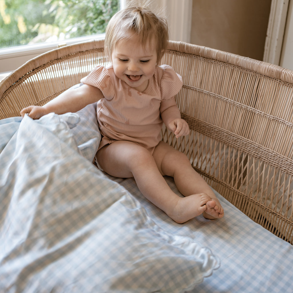 Child in Crib with Baby Duvet in Blue Gingham