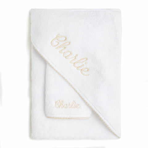 Baby Hooded Towel with Beige Trim detail. Can be personalized with childs name. Towel is folded with washcloth.