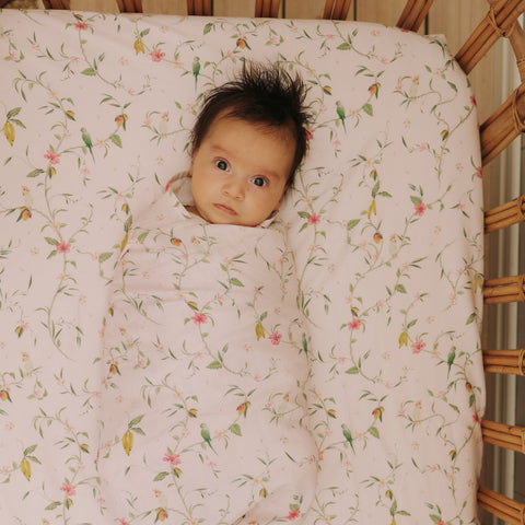 Dreaming of Paradise Swaddle with baby wrapped up inside