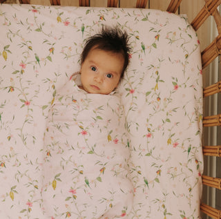 Dreaming of Paradise Swaddle with baby wrapped up inside