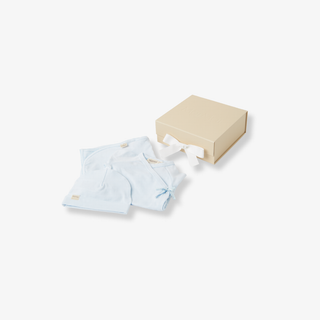 Light blue baby outfit with a beige box on a white background
