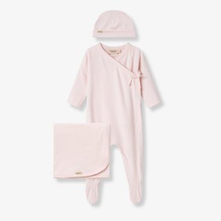 Pink baby outfit set with hat, blanket, and footed romper on a white background