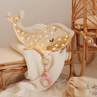 Little Lights Whale Lamp on bed