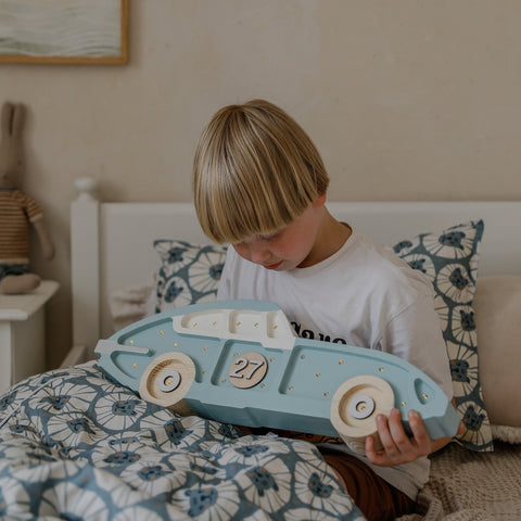 boy holding Little Lights Race Car Lamp 