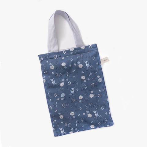  Printed tote bag is included with toddler duvet in "Into The Woodlands" print in the color blue