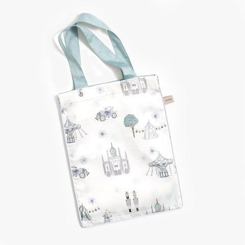 Printed tote bag is including with bedding in "Adventures in Wonderland" print in the color aqua