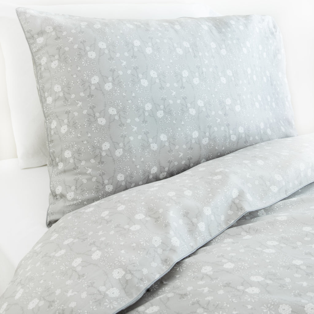 Personalize Me: Twin duvet sheet set in the "Bird's Song" print in the color grey, the set includes a duvet cover and a standard pillowcase