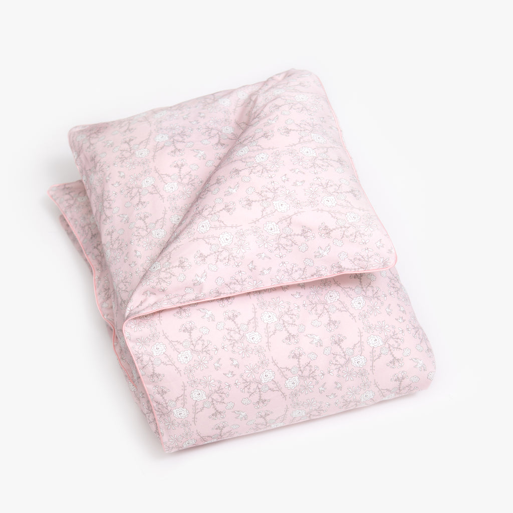 Baby duvet in the "Bird’s Song" print in the color pink