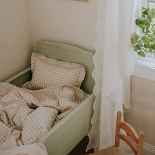 Toddler bed with the Toddler Duvet and Pillow in the Picnic Gingham print in Beige