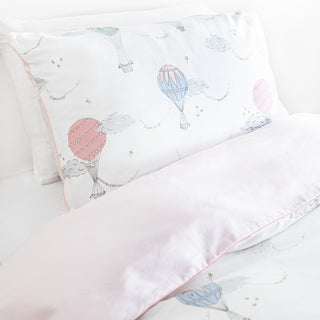 Twin duvet sheet set in the "Touch The Sky" print in the color pink, the set includes a duvet cover and a standard pillowcase