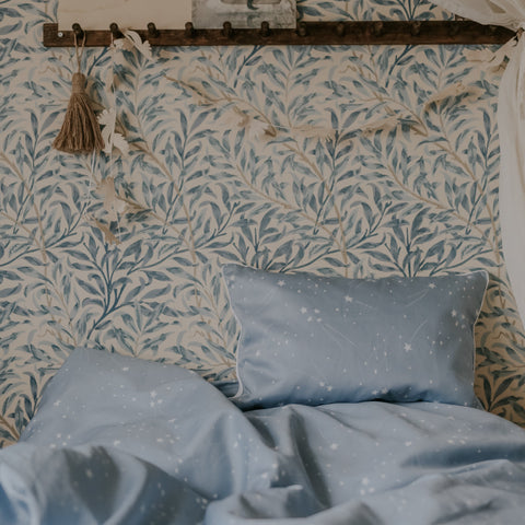 Toddler bed featuring our "Once Upon A Time" print in the color blue duvet and toddler pillow