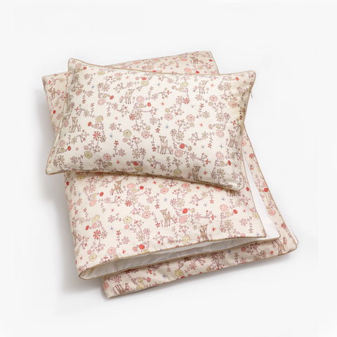 Toddler duvet in the "Into The Woodlands" print in the color ivory, with the matching toddler pillow