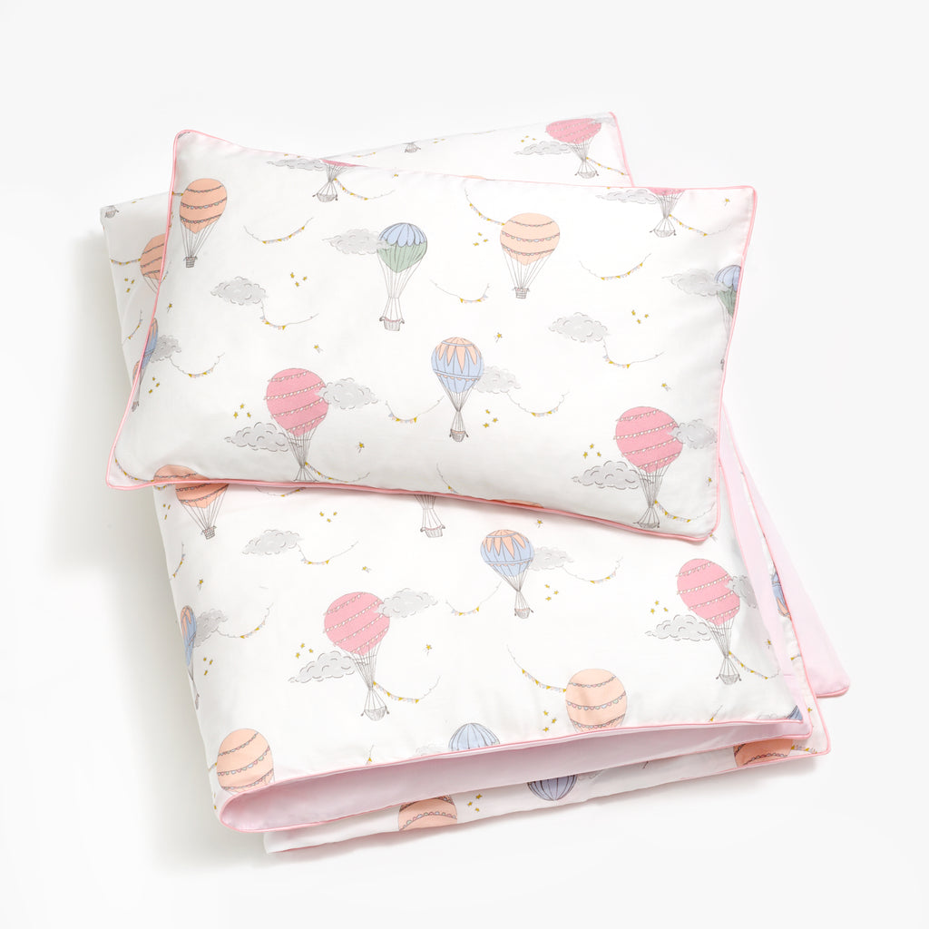 Personalize Me: Toddler duvet in the "Touch The Sky" print in the color pink, with the matching toddler pillow