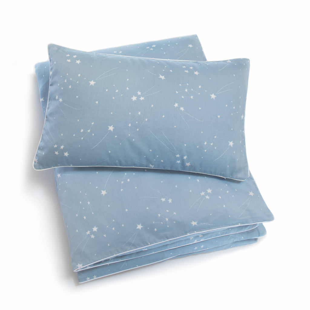 Toddler duvet in the "Once Upon A Time" print in the color blue, with the matching toddler pillow