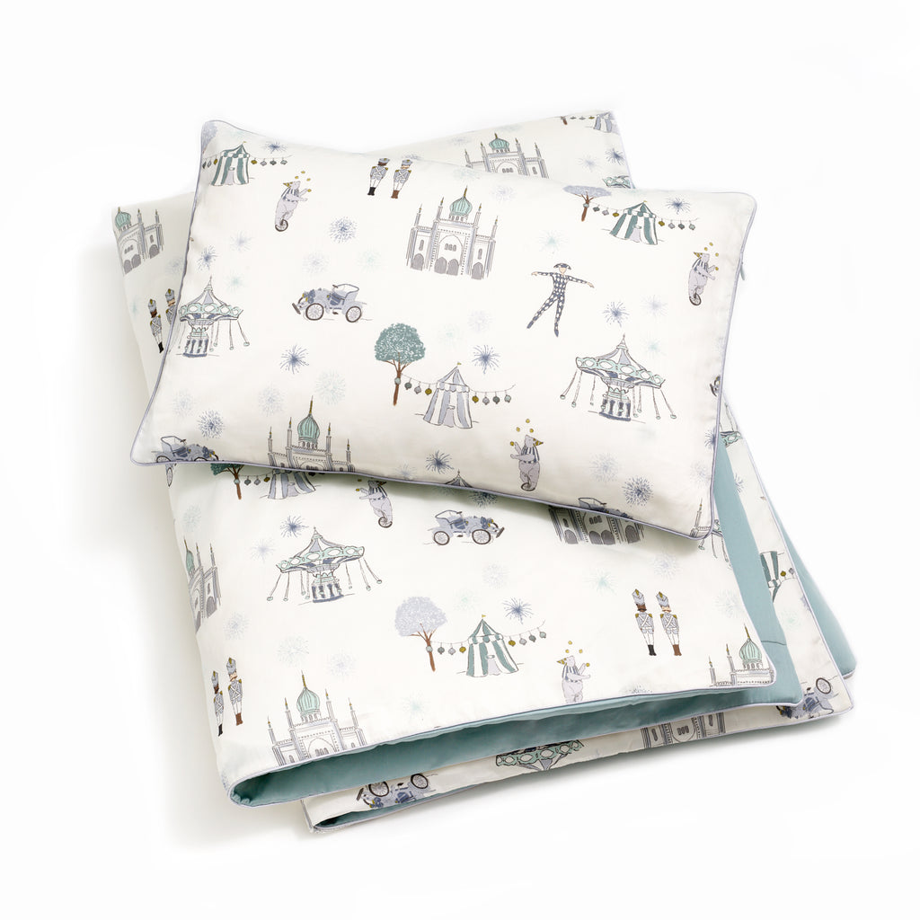 Personalize Me: Toddler duvet in the "Adventures in Wonderland" print in the color aqua, with the matching toddler pillow