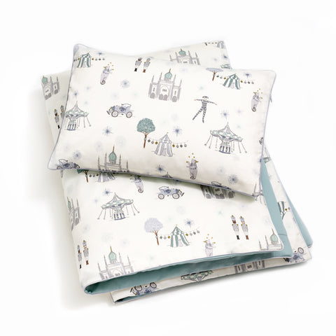 Toddler duvet in the "Adventures in Wonderland" print in the color aqua, with the matching toddler pillow