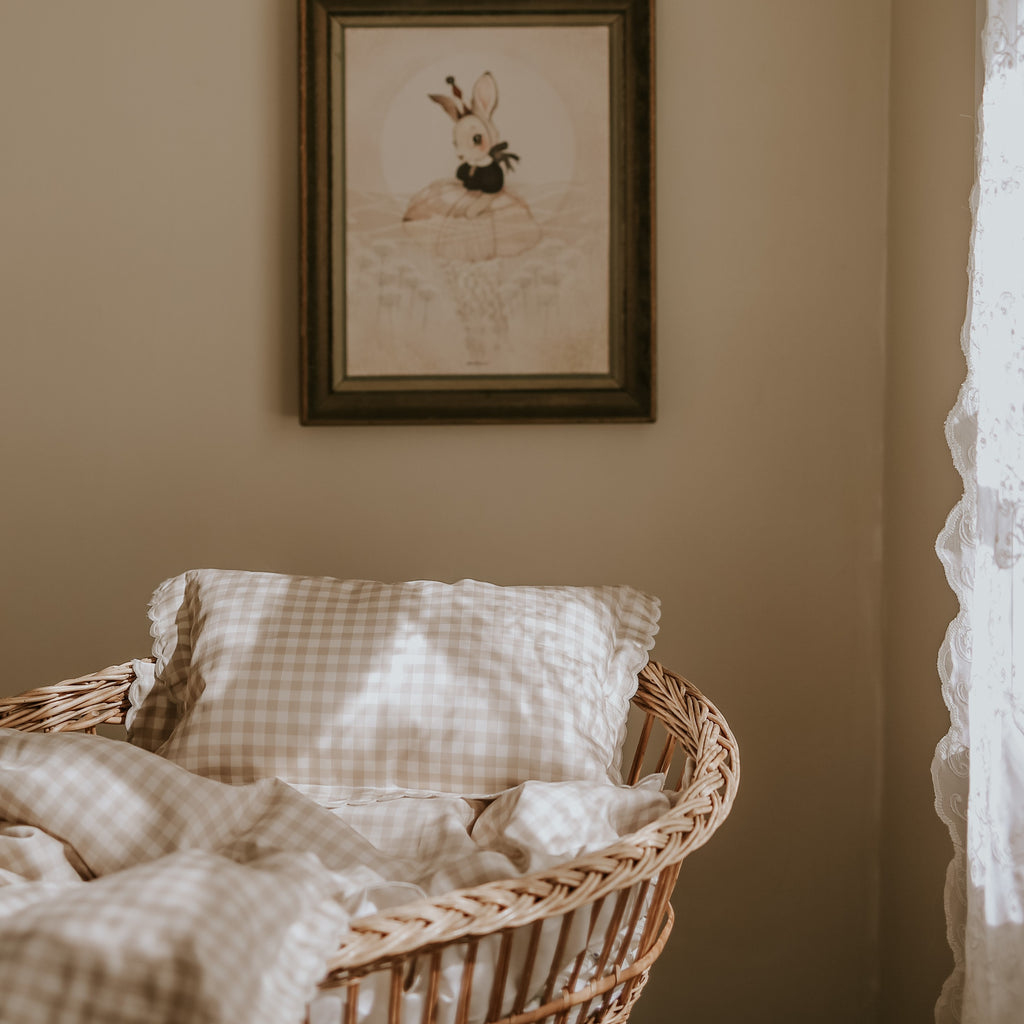 Baby duvet and toddler pillow in crib in the Picnic Gingham Print in the Beige Color