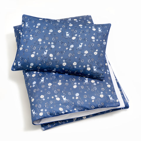 Toddler duvet in the "Into The Woodlands" print in the color blue, with the matching toddler pillow