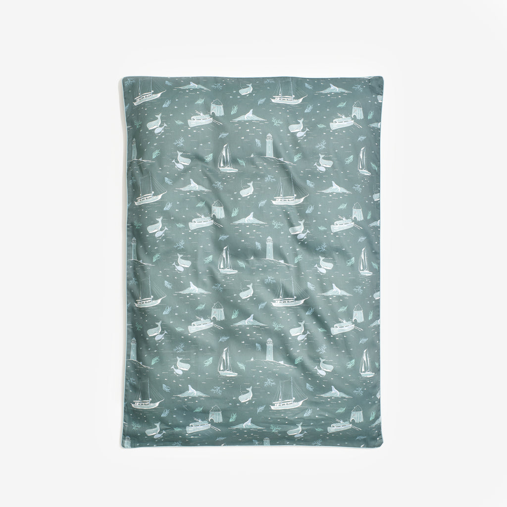 Never Stop Exploring Toddler Duvet Laid Flat in Color Sea