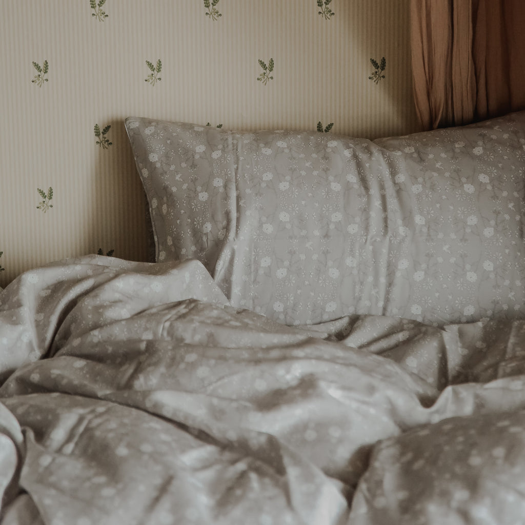 Twin duvet sheet set in the "Bird's Song" print in the color grey, the set includes a duvet cover and a standard pillowcase