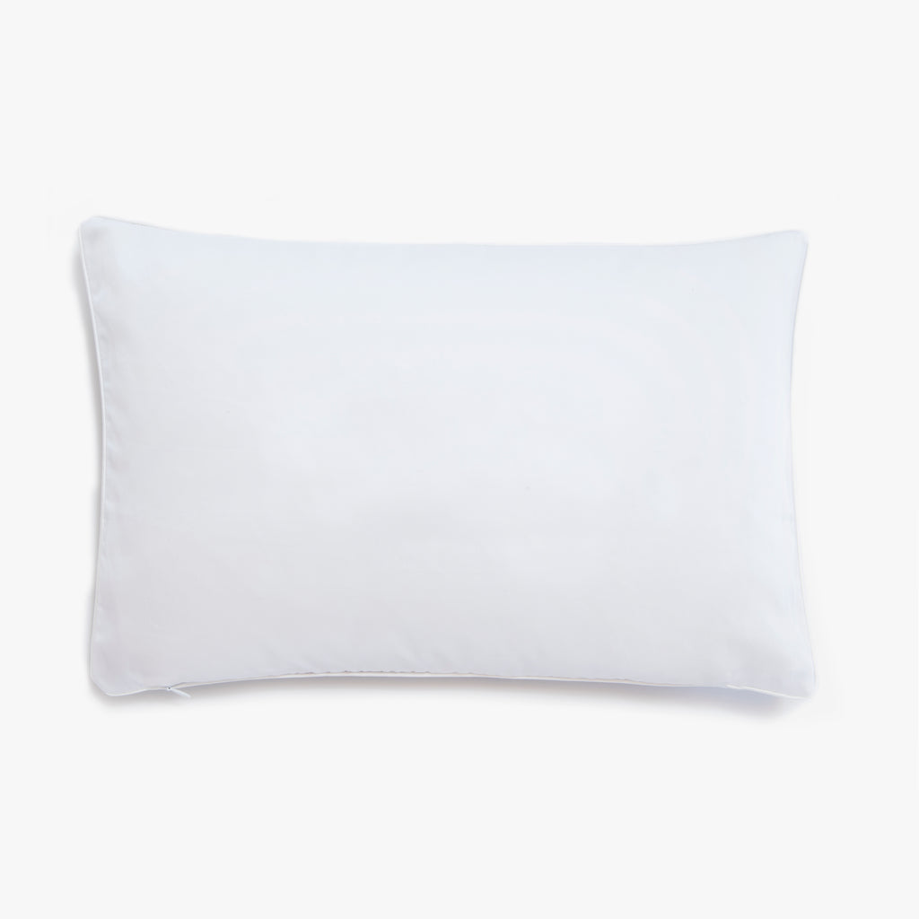 Solid color of the back side of the "Once Upon A Time " print of the toddler pillow in the color white